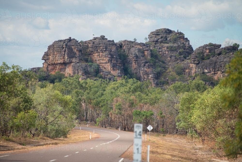 Rocks and road in Kakadu - Australian Stock Image