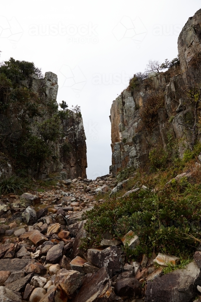 Rocky coastal landscape on overcast day - Australian Stock Image