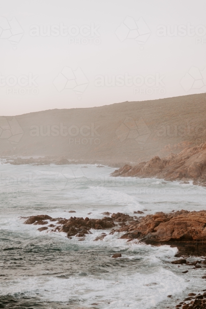 Rocky coastline at dusk - Australian Stock Image