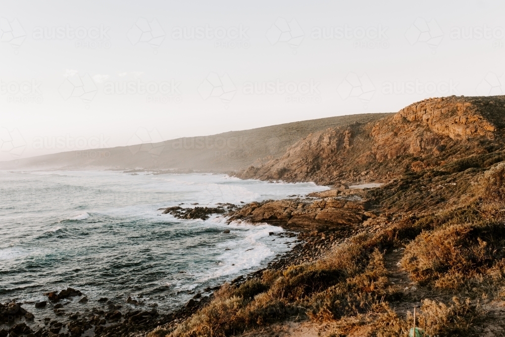 Rocky coastline at dusk - Australian Stock Image