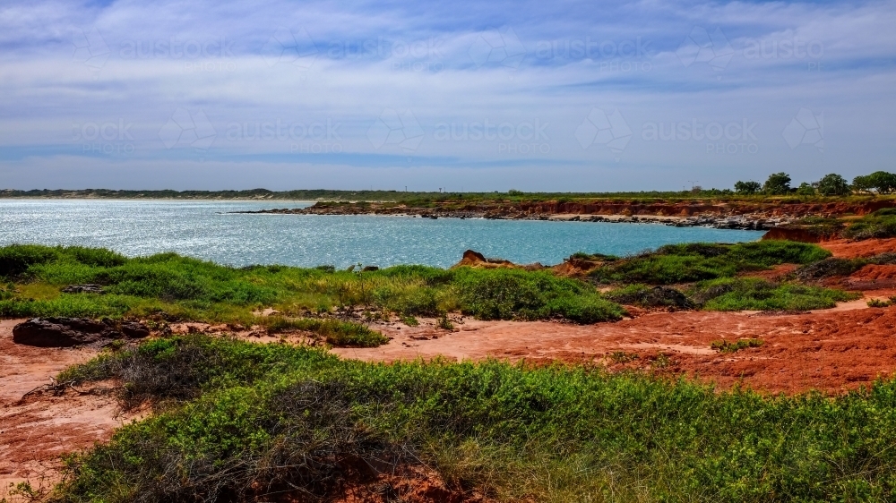 Rocky coastline with ocean and blue sky - Australian Stock Image