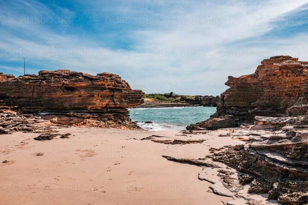 Rocky coastline with ocean and blue sky - Australian Stock Image