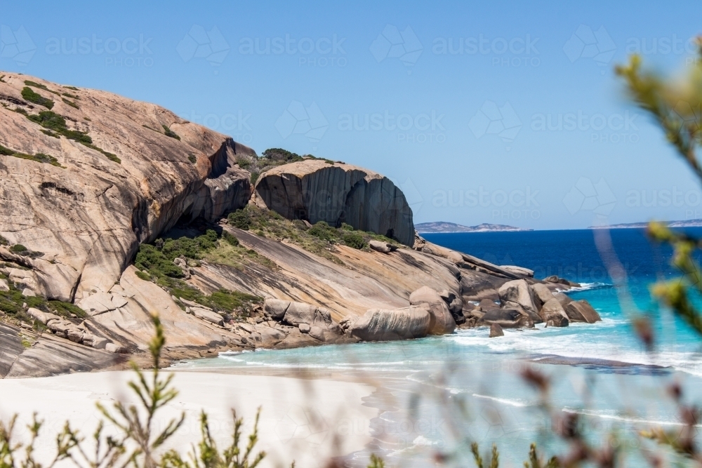 Rocky outcrop meets the ocean - Australian Stock Image