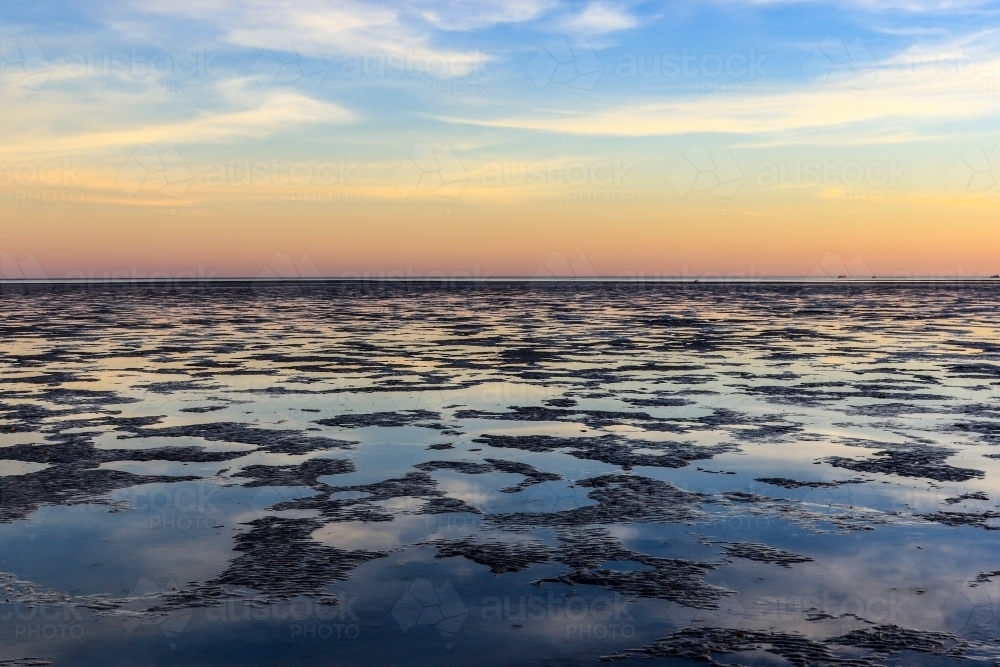 Roebuck Bay mudflats at dusk - Australian Stock Image