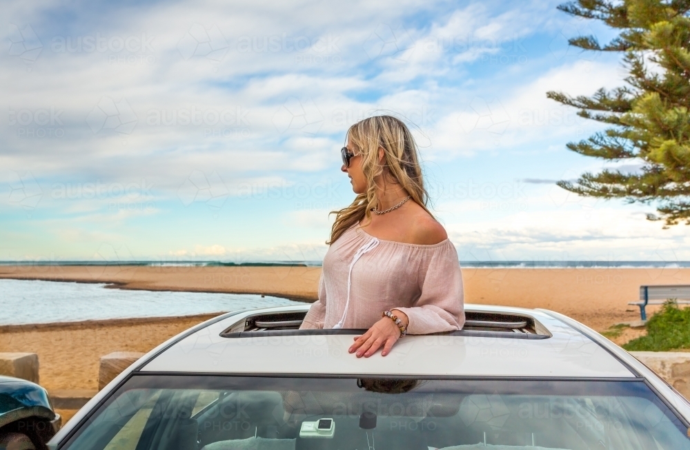 Rolad trip summer beach vibes at Avoca Beach - Australian Stock Image