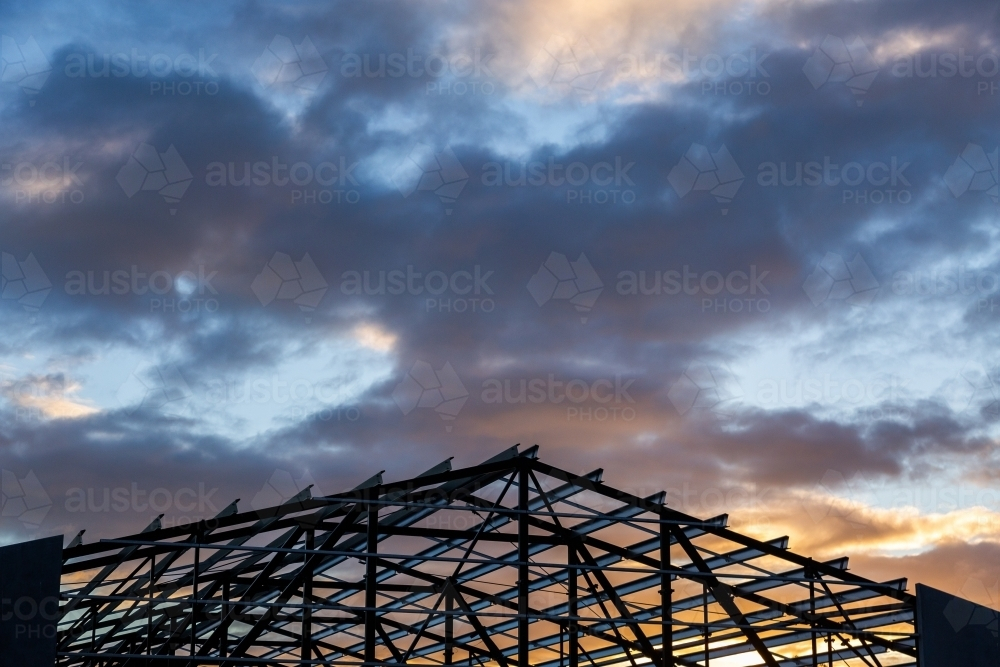 roof frame beams of building under construction - Australian Stock Image