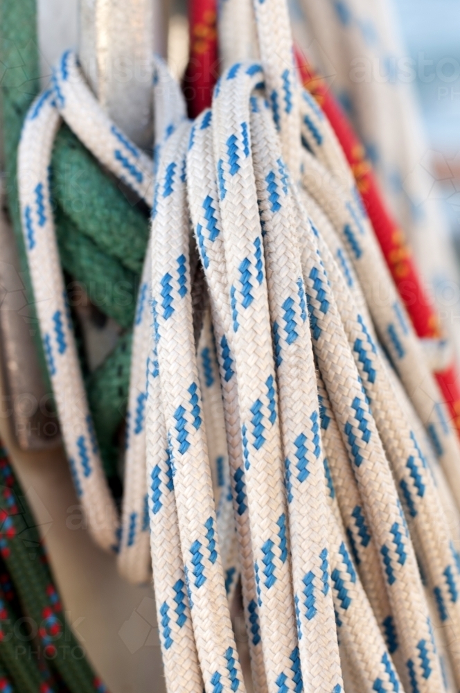 Rope wound around a hook on a sailing boat - Australian Stock Image