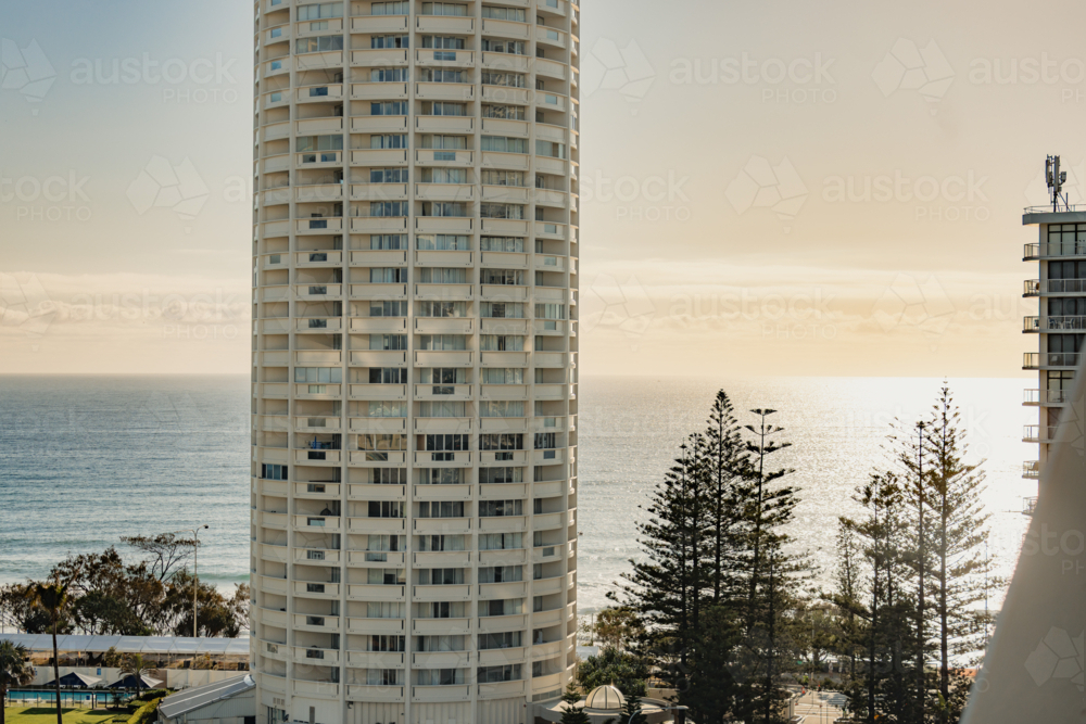 Image of Round high-rise apartment building overlooking the ocean on ...
