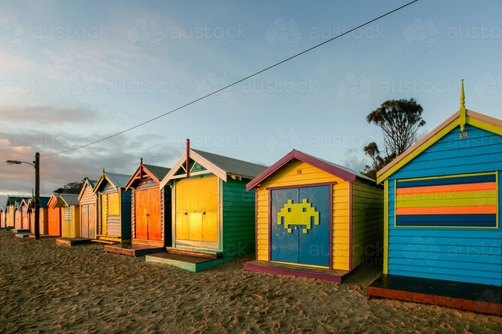 Row of bathing boxes at a city beach - Australian Stock Image