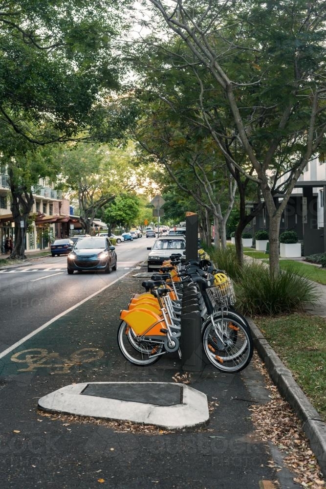 Row of bikes for hire on an inner-city street - Australian Stock Image