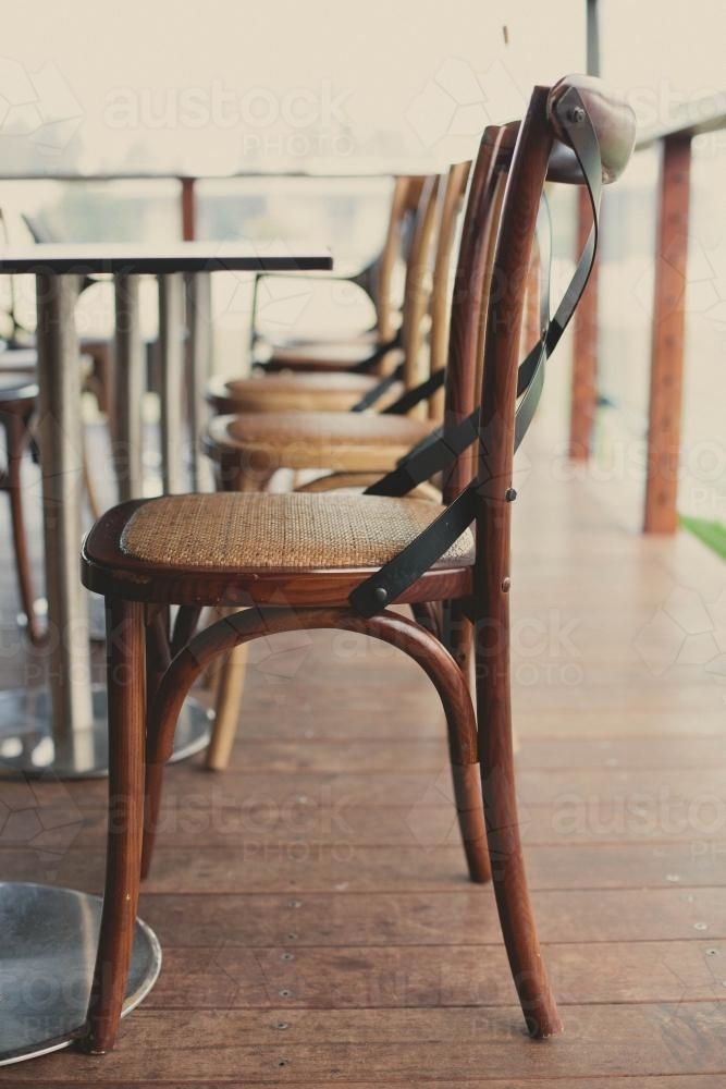 Row of chairs at a restaurant - Australian Stock Image