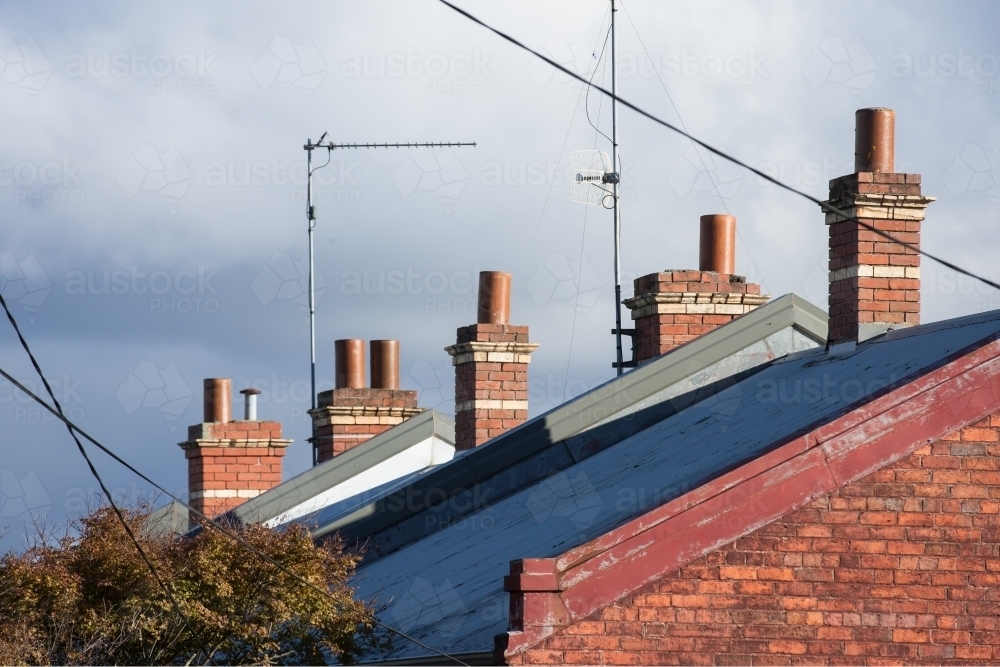 Row of chimneys on terrace houses - Australian Stock Image