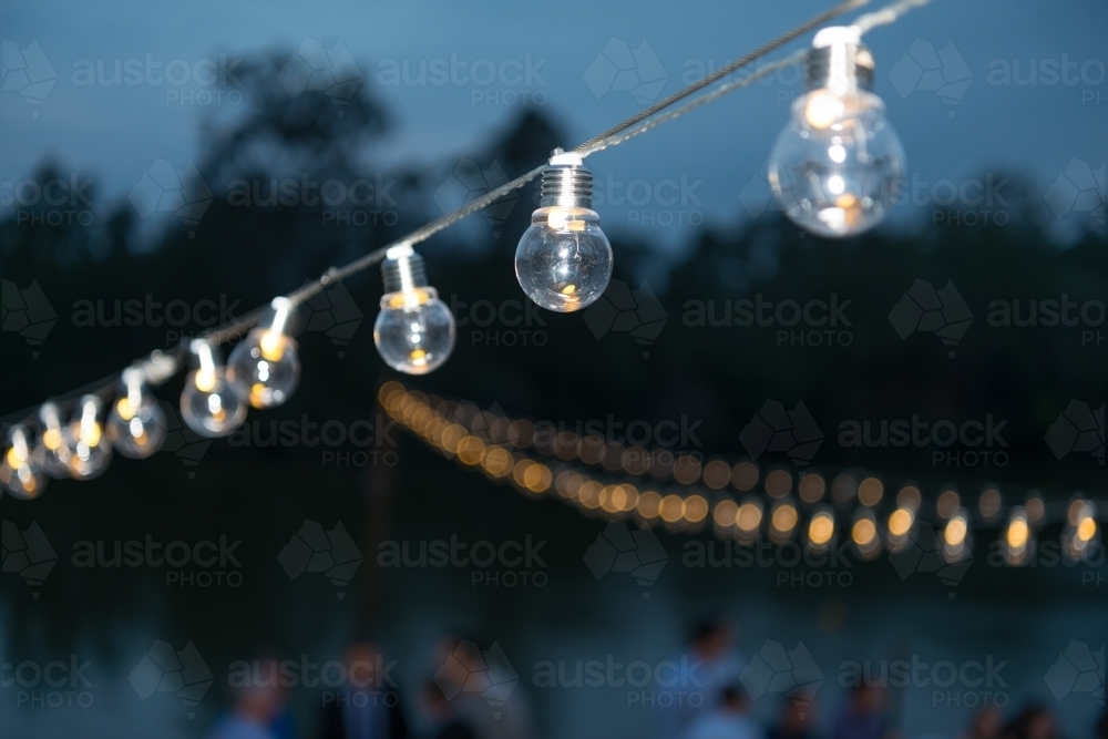 Row of party lights at dusk - Australian Stock Image