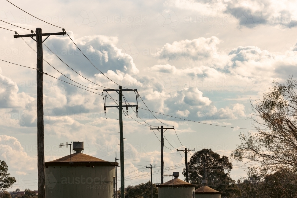 Row of silos and power lines at Tamworth NSW - Australian Stock Image
