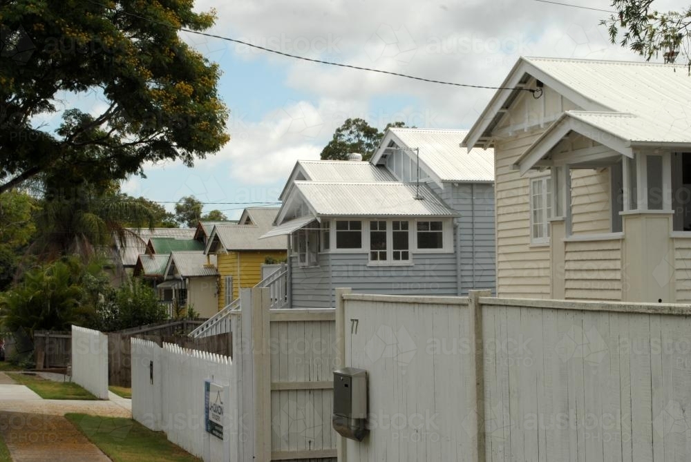 Row of wooden Queenslander houses - Australian Stock Image