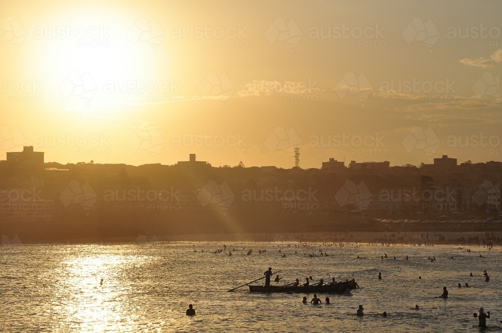 Rowing boat at sunset - Australian Stock Image