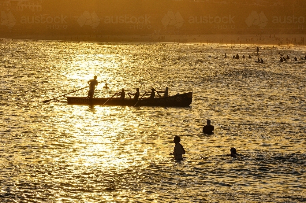 Rowing boat in golden light - Australian Stock Image