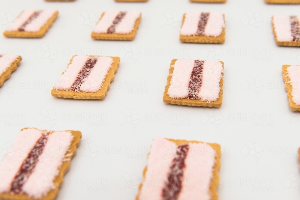 Rows of iced vovo biscuits - Australian Stock Image
