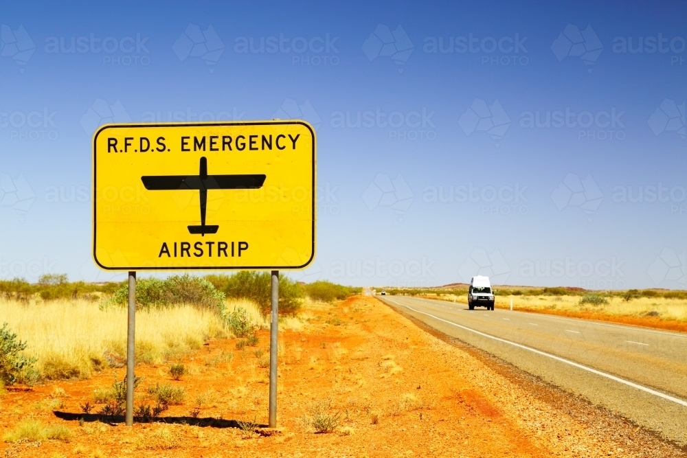 Royal Flying Doctor Service emergency airstrip on highway - Australian Stock Image