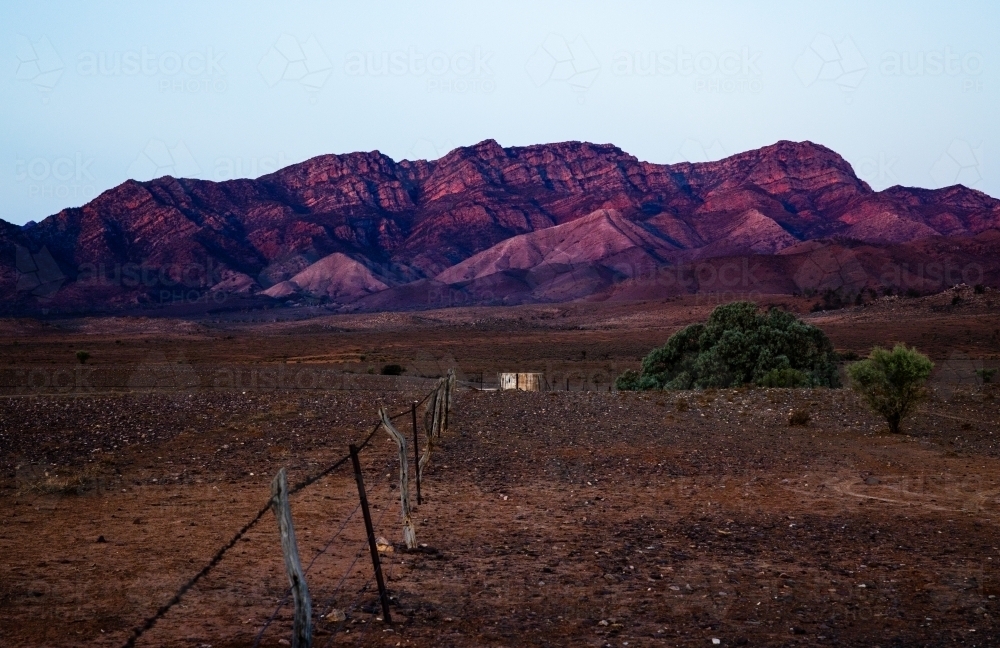 Image of rugged ranges at dusk - Austockphoto
