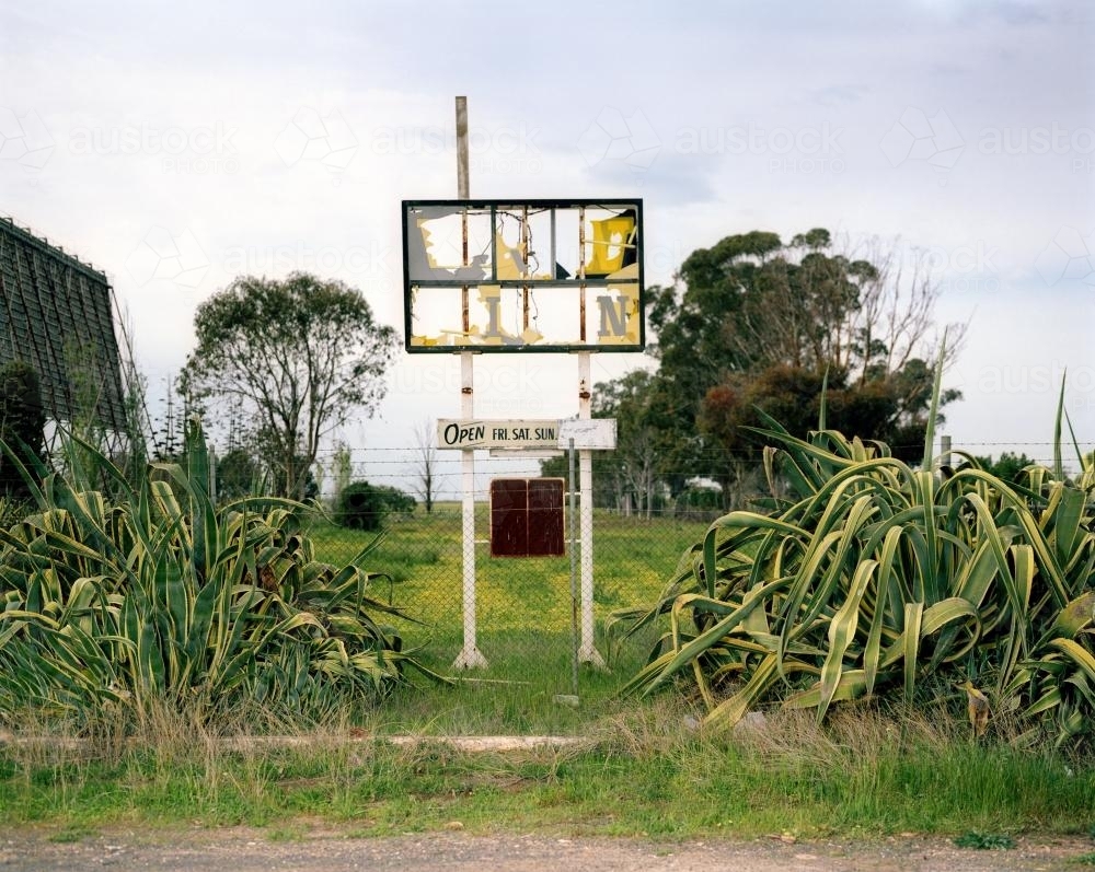 Ruined motel signage in remote town - Australian Stock Image