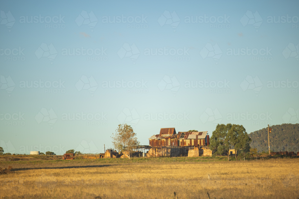 Ruins of rustic old shed on rural farm - Australian Stock Image