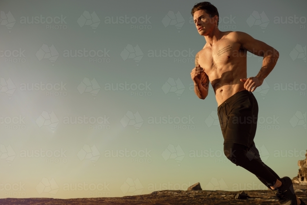 Running man in the early morning - Australian Stock Image
