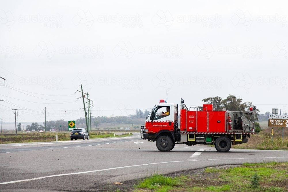 Rural fire service truck turning onto highway - Australian Stock Image