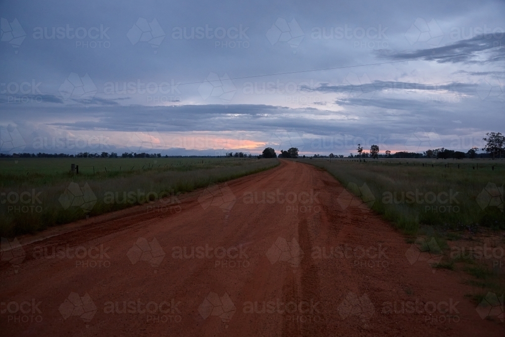 Rural road and landscape on sunset - Australian Stock Image