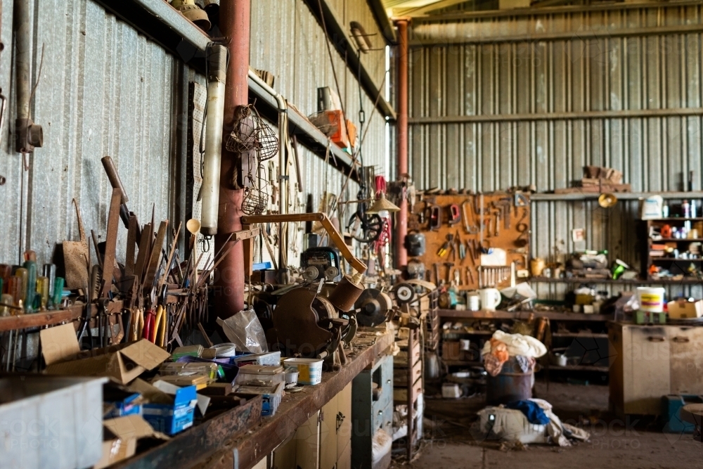 Rusted old tools in rural farm shed still in use - Australian Stock Image
