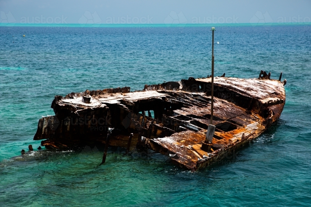 rusted shipwreck off Heron Island on the Great Barrier Reef - Australian Stock Image