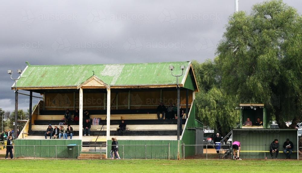 Rustic green grandstand at Wirrabara Oval on overcast day - Australian Stock Image