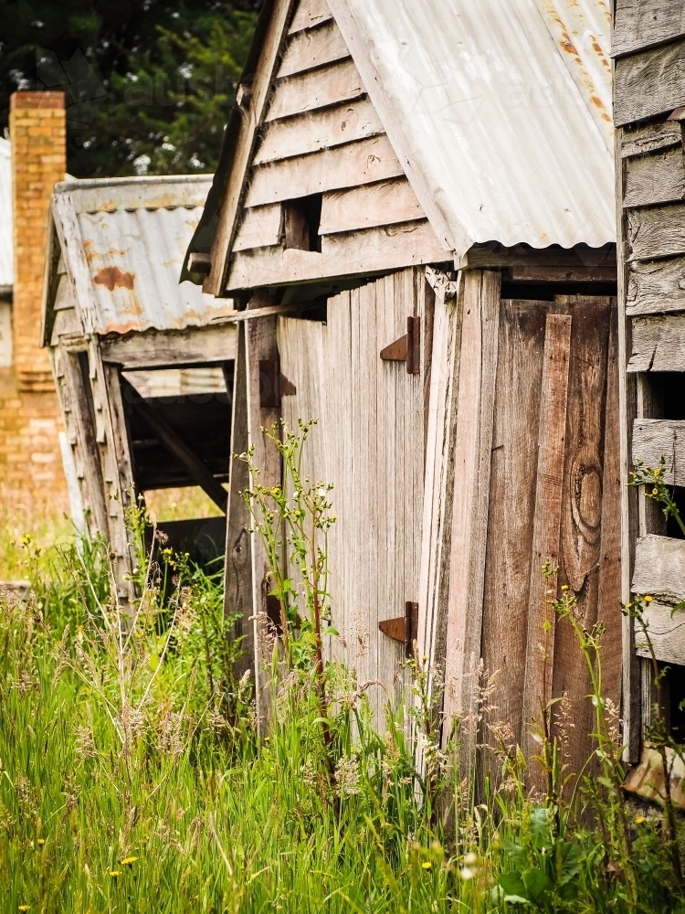 Rustic shed with hinged timber door - Australian Stock Image
