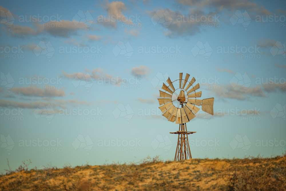 Rustic windmill in the Australian countryside - Australian Stock Image