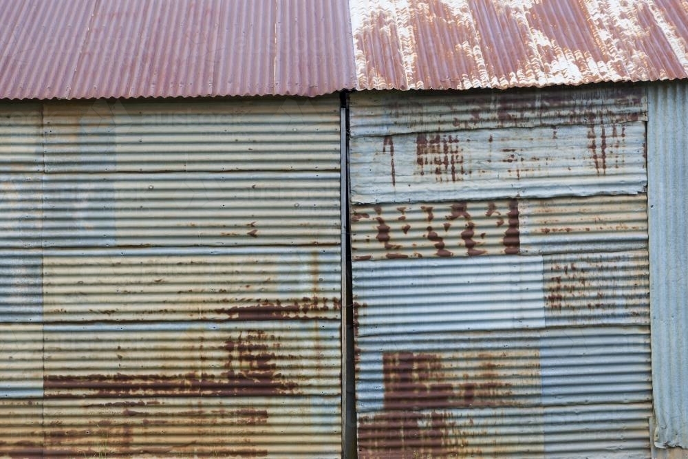 Rusty corrugated iron wall of rural shed - Australian Stock Image