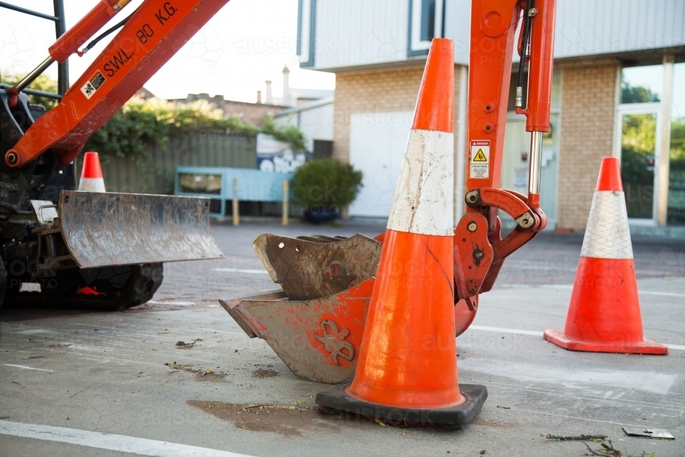 Image of Safety cones marking off hazard work site Austockphoto