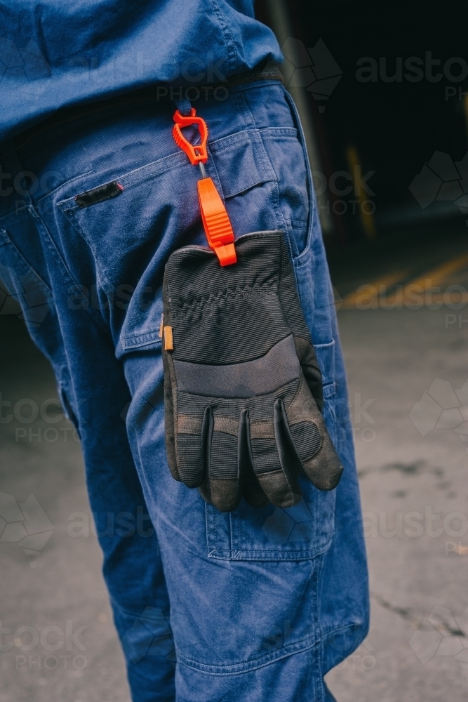 Safety work pants with black gloves - Australian Stock Image