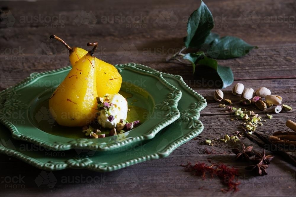 Saffron pears with marscapone and ingredients - Australian Stock Image
