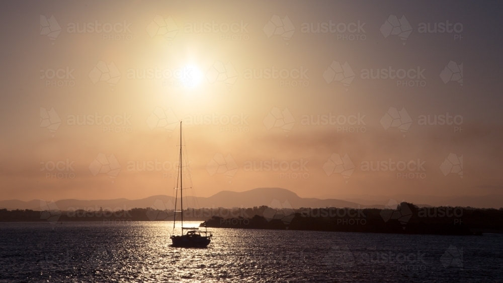 Sailboat at sunset - Australian Stock Image