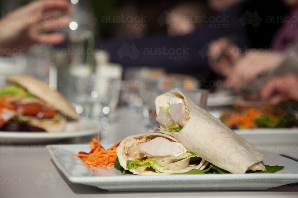 Salad wrap lunch at a restaurant - Australian Stock Image