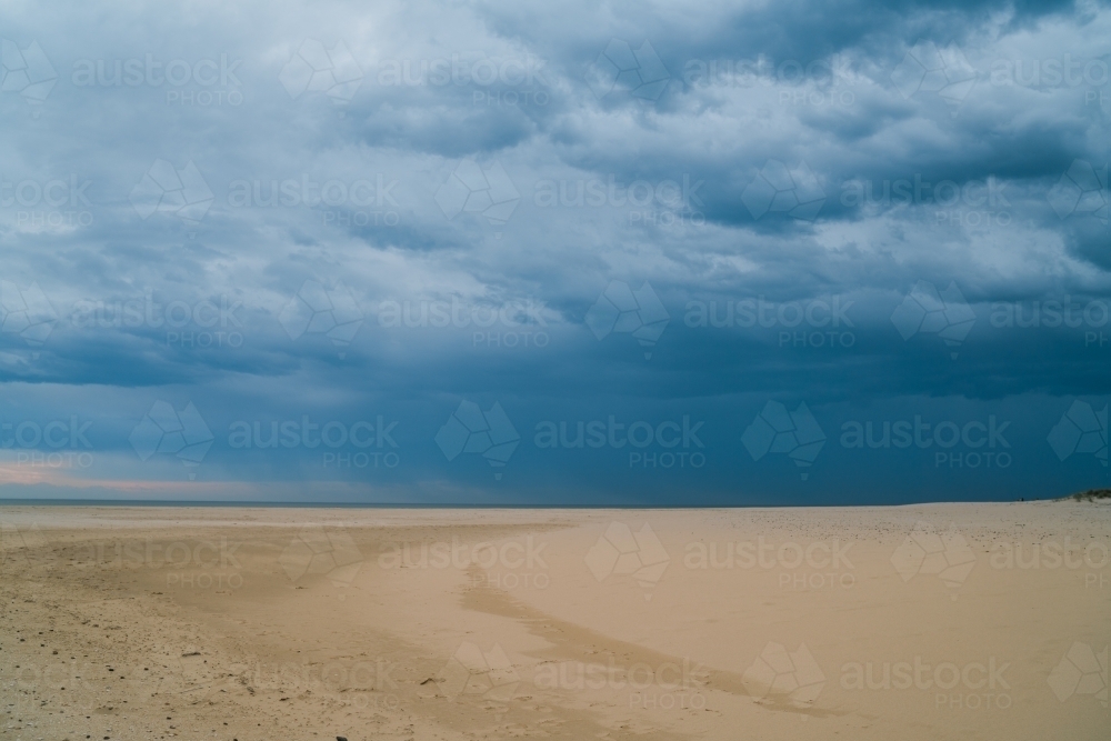 Sand and Cloudy Blue Sky - Australian Stock Image