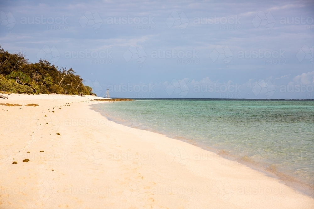 sandy beach and tropical waters of Heron Island without anyone - Australian Stock Image