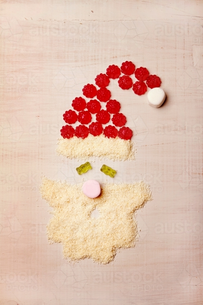 Santa claus shape made from lollies and coconut - Australian Stock Image