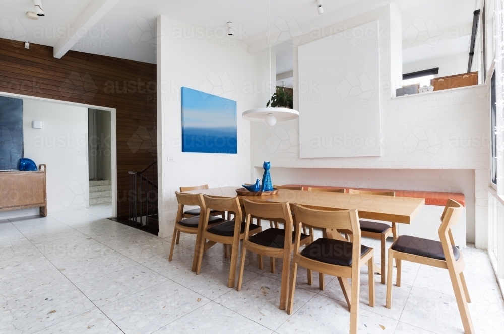 Scandinavian style interior dining room in mid century modern home - Australian Stock Image