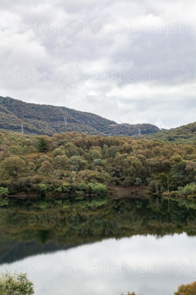 Scenery of lake with still water, Jounama Pondage - Australian Stock Image