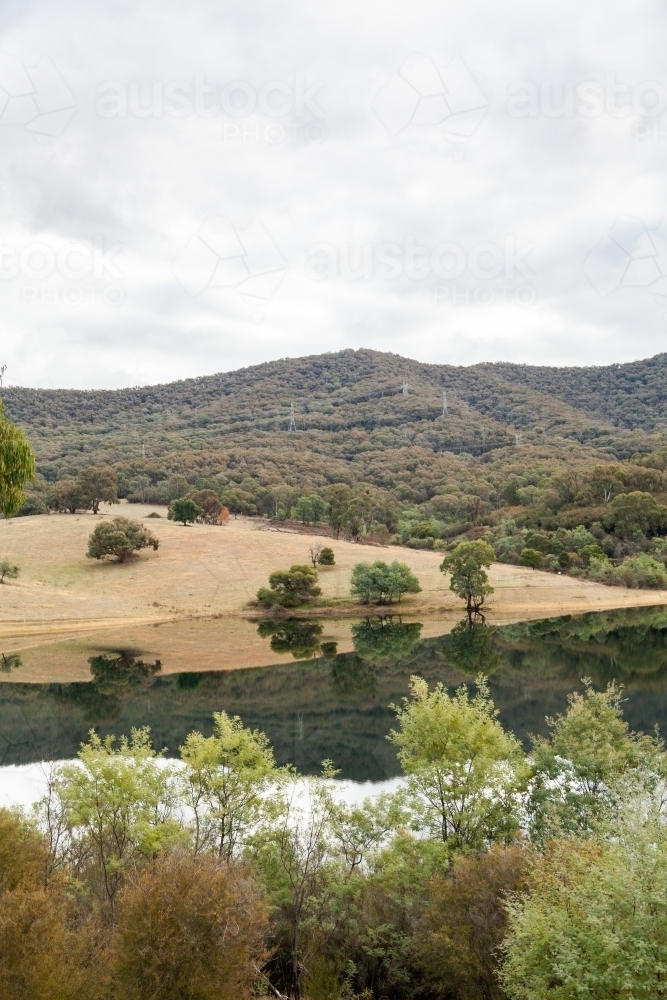Scenery of lake with still water, Jounama Pondage - Australian Stock Image