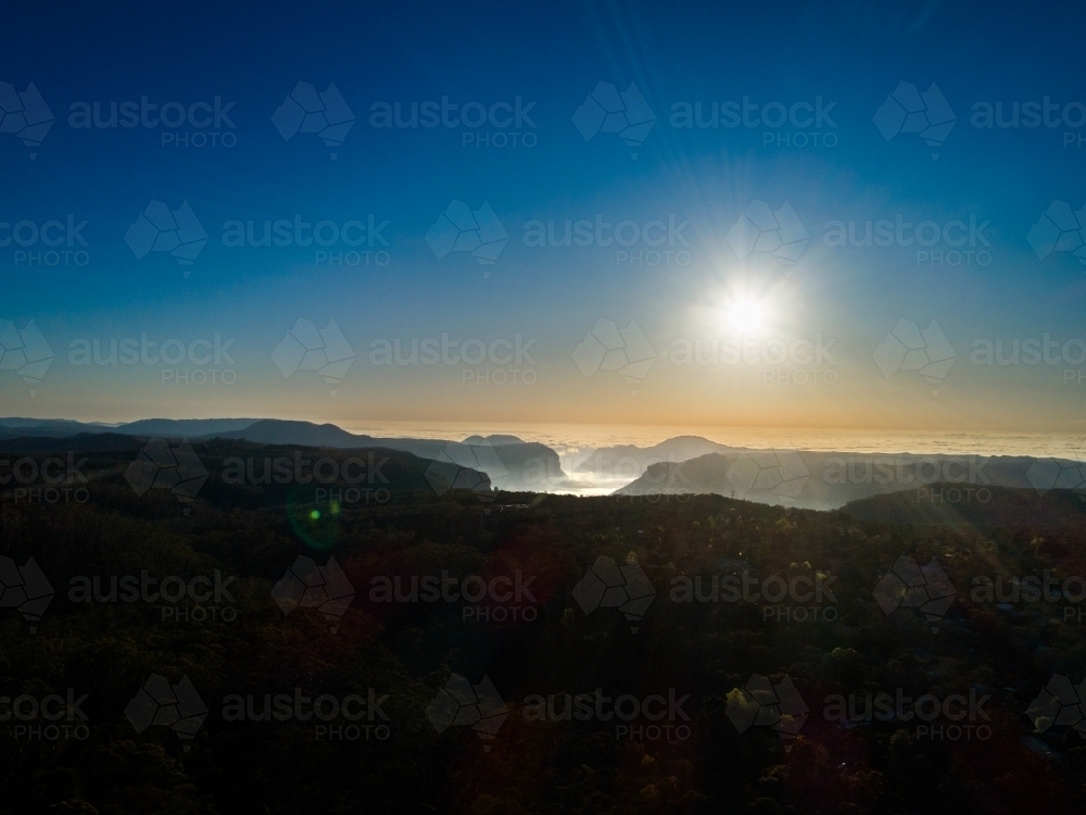 Scenic blue mountains view of landscape and fog filled canyon among hills - Australian Stock Image