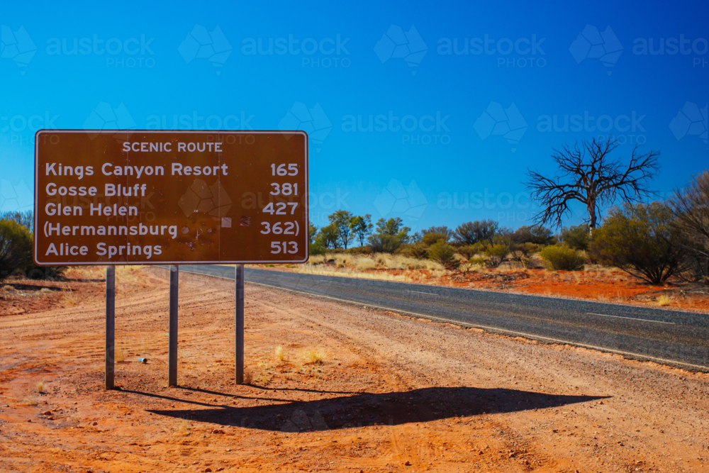 Scenic Route road sign directing towards Uluru and Kings Canyon in the Northern Territory, Australia - Australian Stock Image