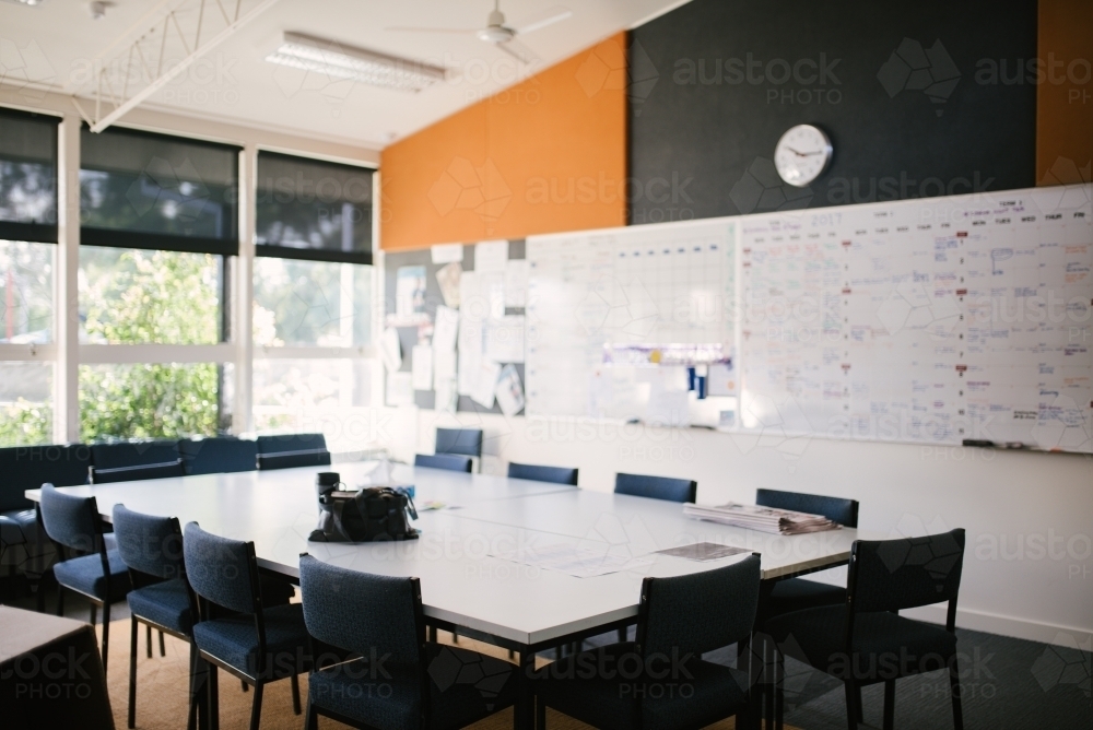 School staff room table with whiteboard - Australian Stock Image