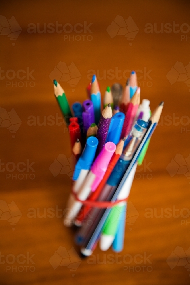 School stationery collected with a rubber band - Australian Stock Image
